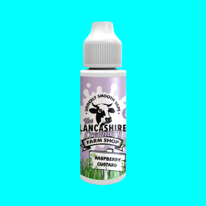 A bottle of Lancashire Creamery raspberry custard e-liquid with a label featuring a cow and the brand name, set against a white background.